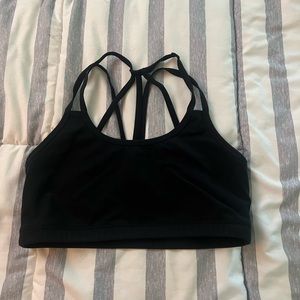 Black born primitive sports bra